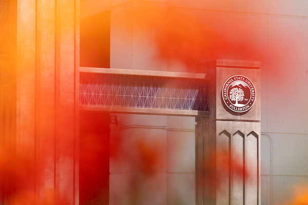 floral design in front of csuf logo